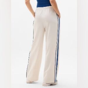 Athleta Cream Wide-Leg Track Pants with Blue Side Stripes